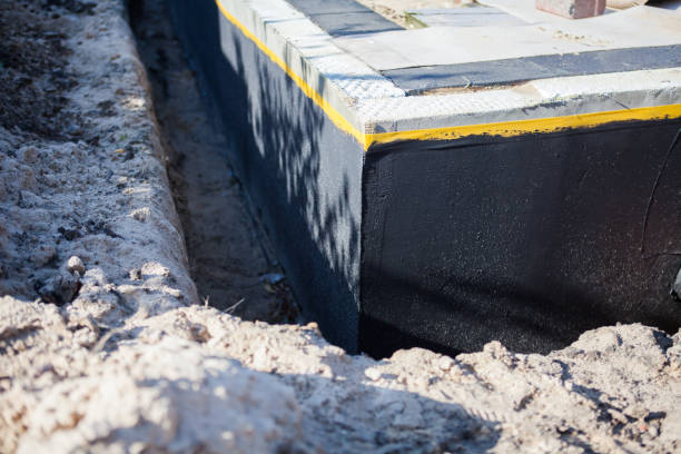 Professional Wet Basement Repair technician working in Shirley, NY